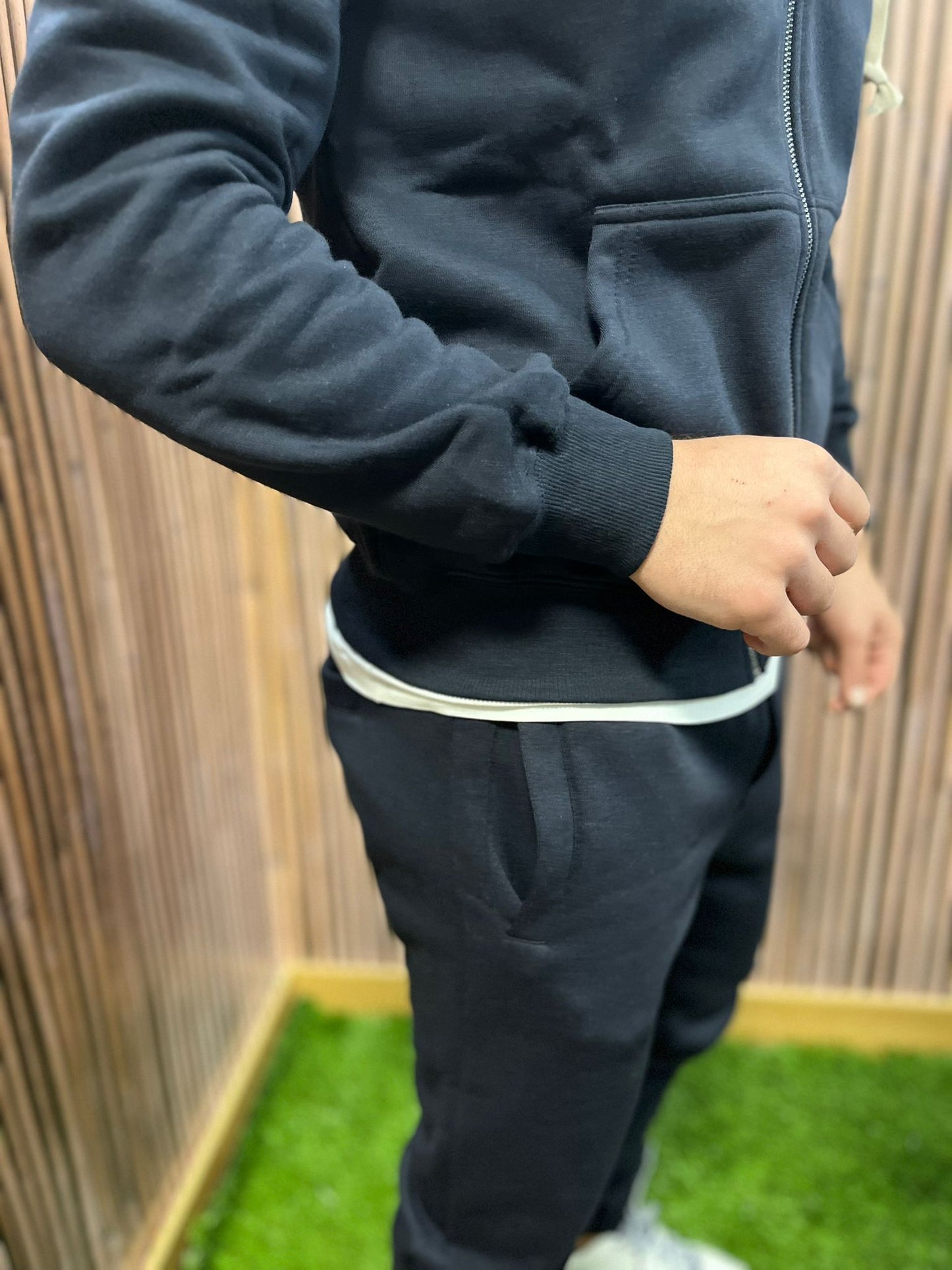Tuta intera felpata con cappuccio e zip
